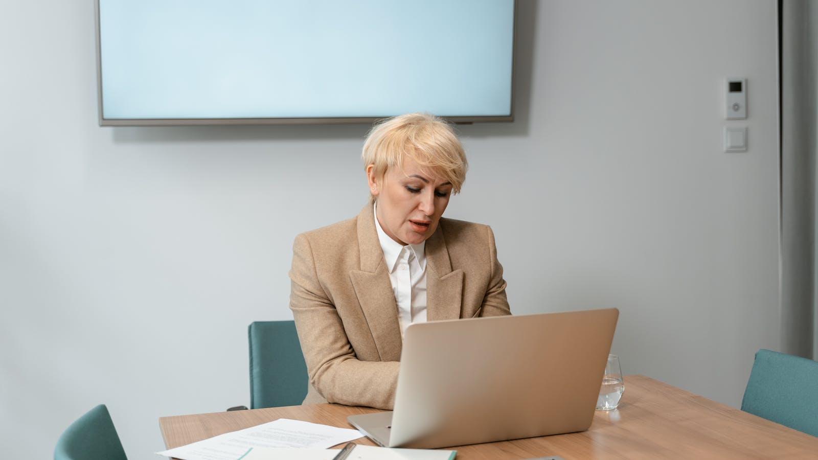 A professional working in a bright modern office setting.