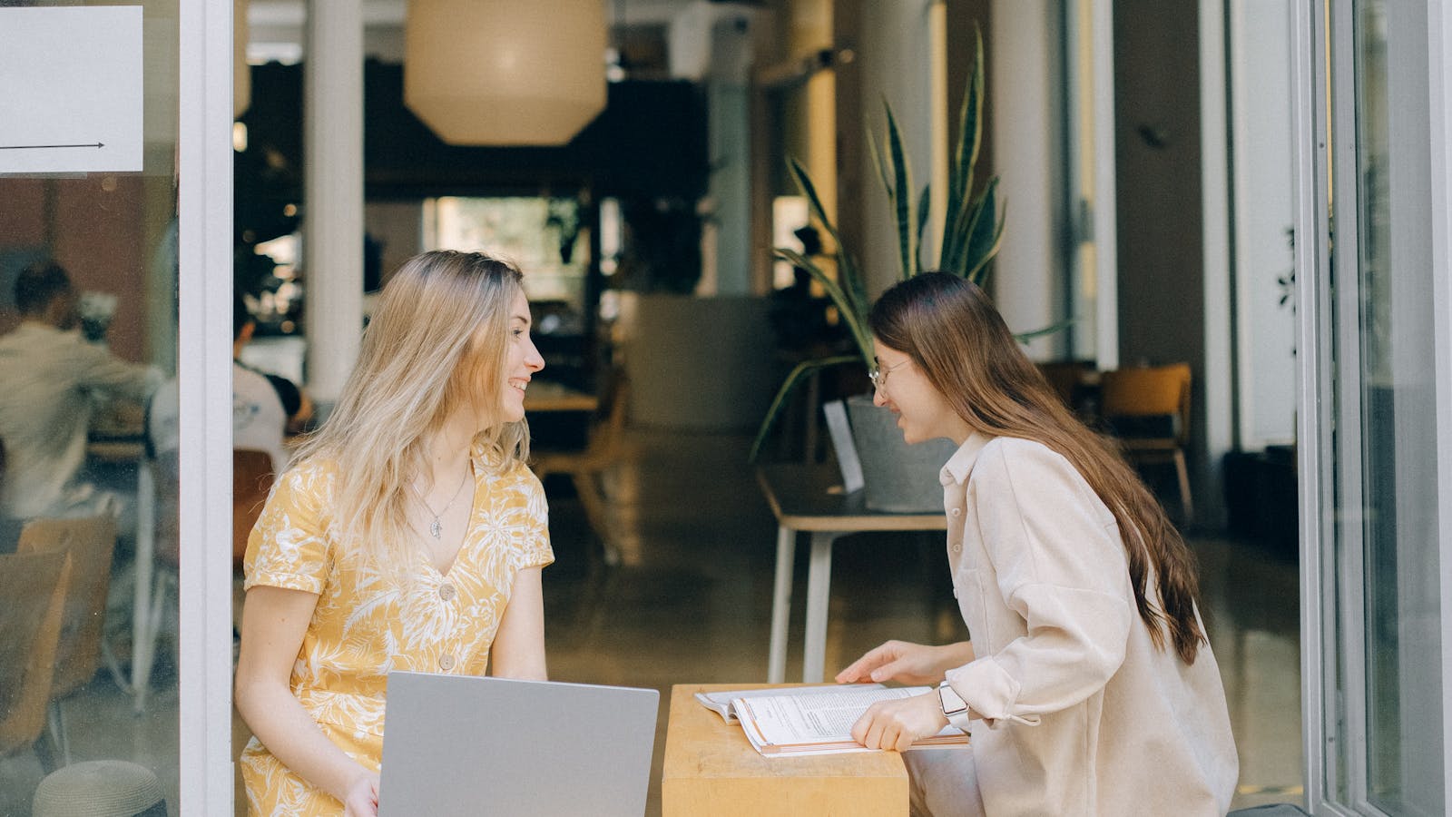A professional working in a bright modern office setting.