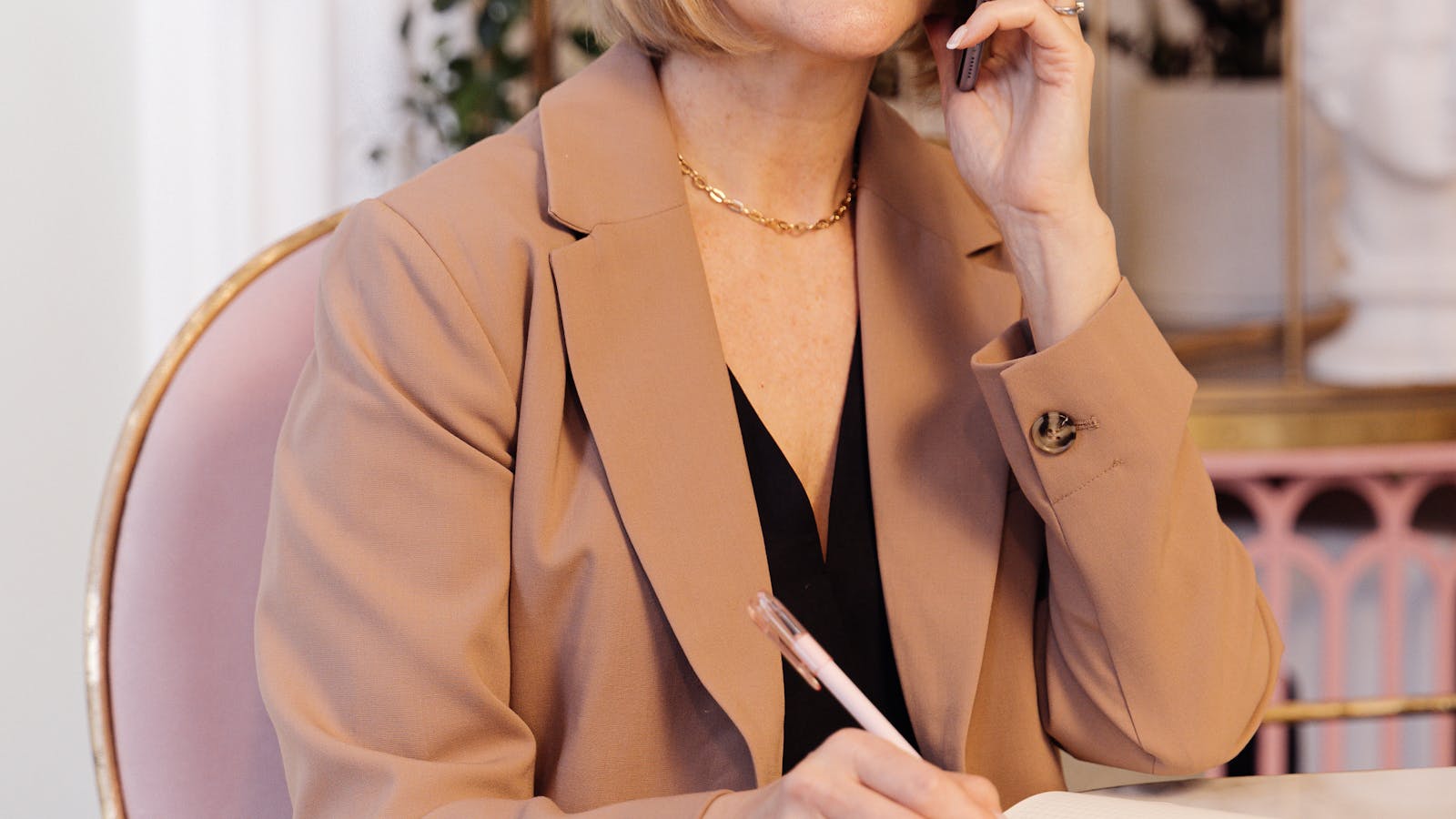 A professional working in a bright modern office setting.