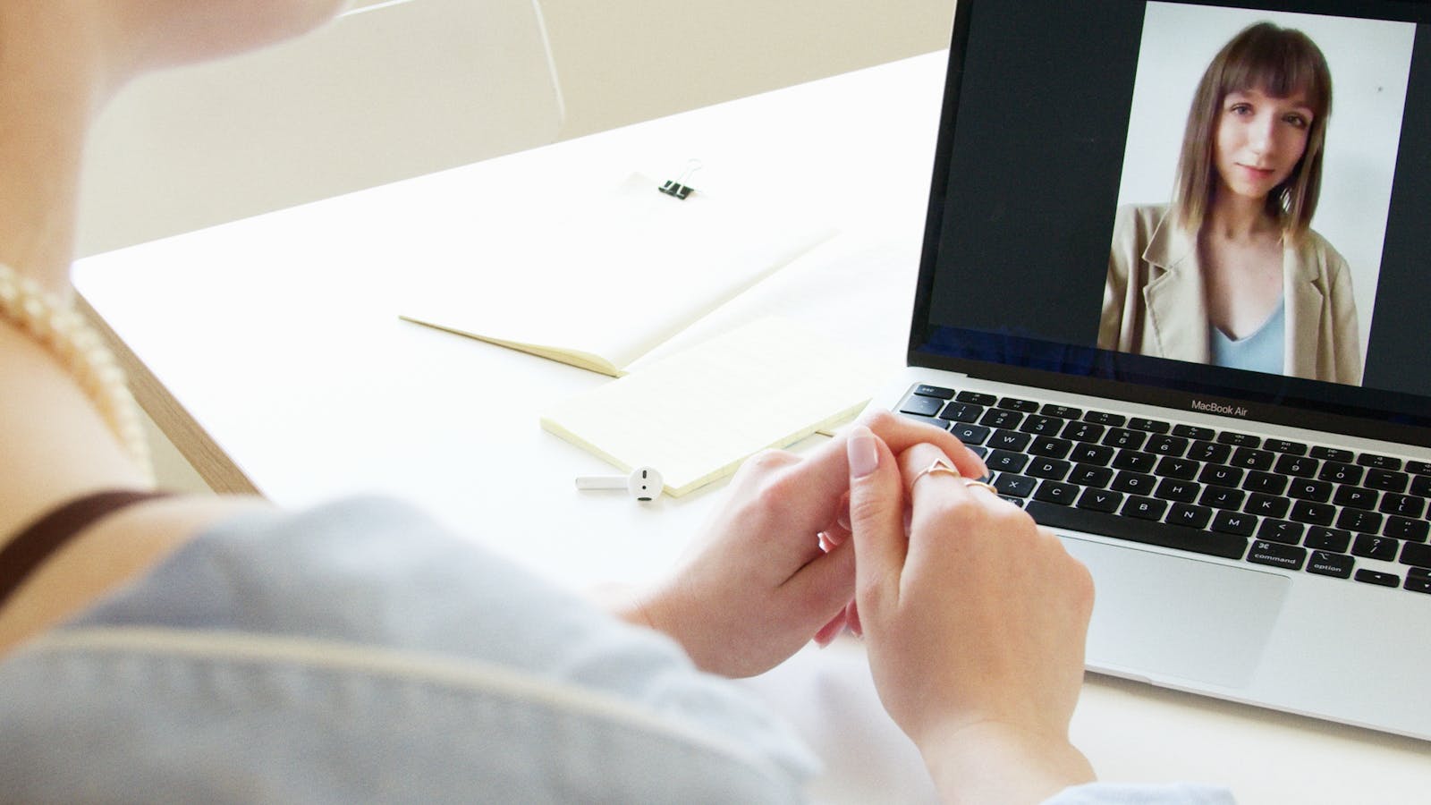A professional working in a bright modern office setting.